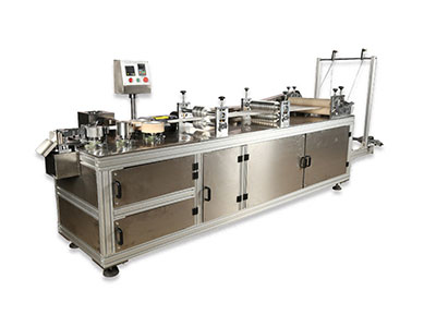 Machine de fabrication de bonnet jetable non tissé