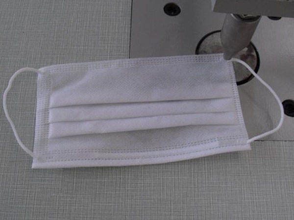 Machine de soudure ultrasons pour boucle de masque jetable