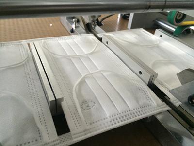 Machine de soudure ultrasons pour boucle interne de masque jetable
