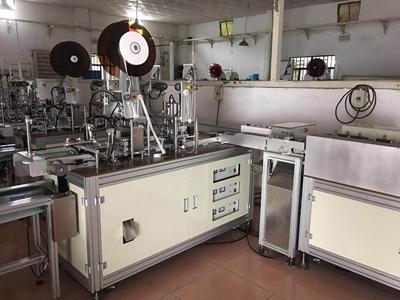 Machine de fabrication de masque jetable en tissu non tissé - entièrement automatique