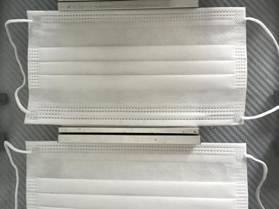 Machine de soudure ultrasons pour boucle externe de masque jetable