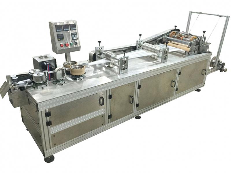 Machine de fabrication par ultrasons de bonnet jetable