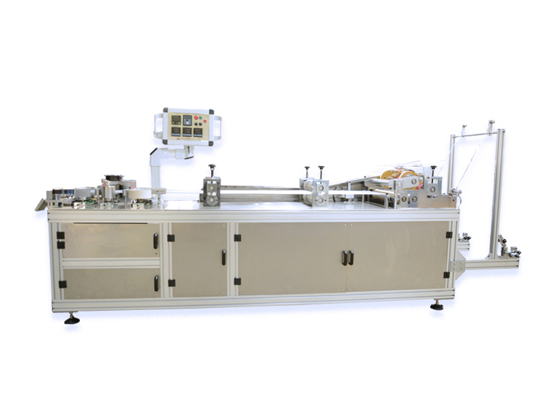 Machine de fabrication de bonnets en plastique/non-tissé