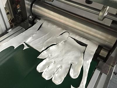 Machine de fabrication par ultrasons pour gants