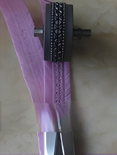 Machine à coudre pour tissu non tissé
